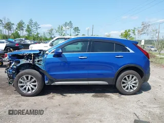 2023 Cadillac XT4 FWD Premium Luxury with VIN 1GYFZCR43PF104796, listed as a IAAI auction lot 41931695 with 12,666 mi miles. Bid and sale history available at carsss.com. Image 14.