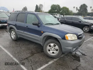 2002 Mazda Tribute LX with VIN 4F2YU09132KM45424, listed as a Copart auction lot 47778905 with 196,982 mi miles and Salvage Title. Bid and sale history available at carsss.com. Image 4.