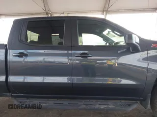 2021 Chevrolet Silverado 1500 LT Trail Boss with VIN 1GCPYFED1MZ449887, listed as a IAAI auction lot 41761670 with 57,324 mi miles and . Bid and sale history available at DreamBid. Image 14.