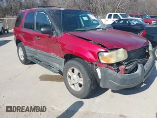 2003 Ford Escape XLT Popular with VIN 1FMYU03143KB33988, listed as a IAAI auction lot 41524123 with 1 mi miles. Bid and sale history available at carsss.com. Image 1.