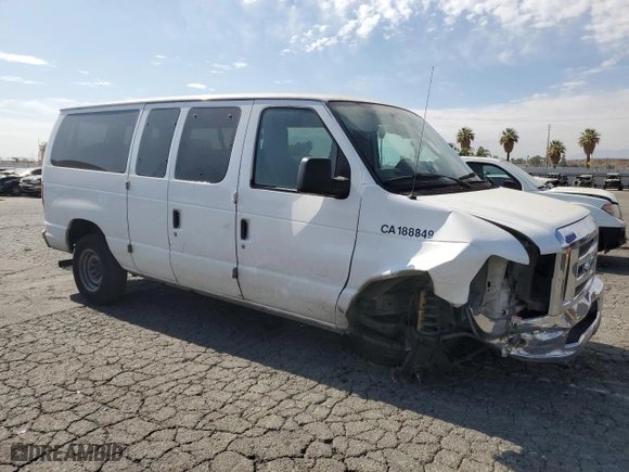 2014 Ford Econoline Wagon XL with VIN 1FBNE3BLXEDA14976, listed as a Copart auction lot 65948404 with 285,655 mi miles and Salvage Title. Bid and sale history available at carsss.com. Image 4.