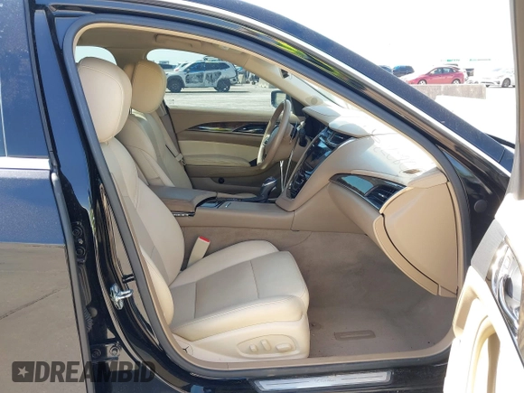 2014 Cadillac CTS Luxury RWD z VIN 1G6AR5SX3E0196348, wystawiony jako IAAI lot #42282732 z przebiegiem 130 956 mil mil oraz . Historia ofert i sprzedaży dostępna na DreamBid. Obrazek 5.
