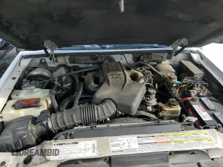 1999 Ford Explorer Sport z VIN 1FMDU24E5XUB50255, wystawiony jako Copart lot #74538014 z przebiegiem 162 352 mil mil oraz Szkoda całkowita • Salvage title. Historia ofert i sprzedaży dostępna na DreamBid. Obrazek 11.