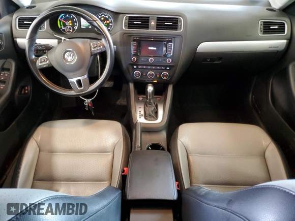 2014 Volkswagen Jetta Hybrid SE z VIN 3VW637AJ2EM288509, wystawiony jako Copart lot #61716065 z przebiegiem 116 461 mil mil oraz Czysty tytuł • Clean title. Historia ofert i sprzedaży dostępna na DreamBid. Obrazek 8.