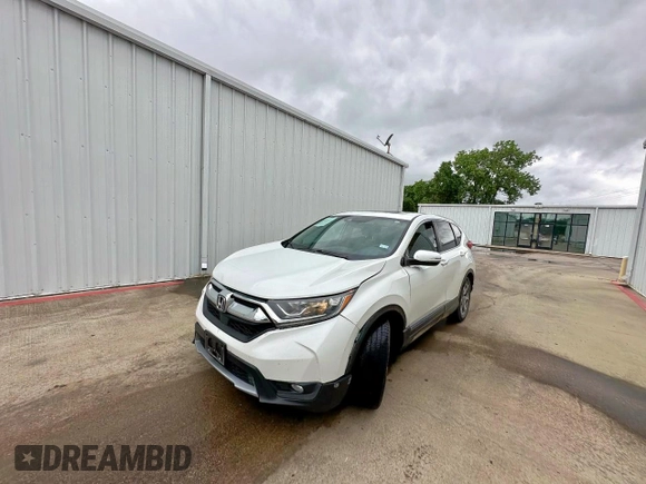 2019 Honda CR-V EX z VIN 7FARW1H50KE036985, wystawiony jako Copart lot #61110265 z przebiegiem 193 050 mil mil oraz Czysty tytuł • Clean title. Historia ofert i sprzedaży dostępna na DreamBid. Obrazek 2.