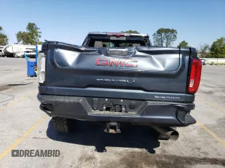 2020 GMC Sierra 3500HD Denali z VIN 1GT49WEY9LF262769, wystawiony jako Copart lot #74386594 z przebiegiem 34 178 mil mil oraz Szkody całkowita. Historia ofert i sprzedaży dostępna na DreamBid. Obrazek 6.