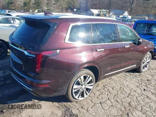2021 Cadillac XT6 Premium Luxury with VIN 1GYKPDRS7MZ133561, listed as a IAAI auction lot 41112365 with 73,956 mi miles. Bid and sale history available at carsss.com. Image 4.