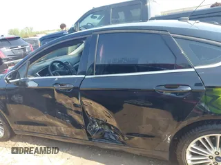 2017 Ford Fusion SE z VIN 3FA6P0H71HR135111, wystawiony jako IAAI lot #42454080 z przebiegiem 120 355 mil mil oraz . Historia ofert i sprzedaży dostępna na DreamBid. Obrazek 14.