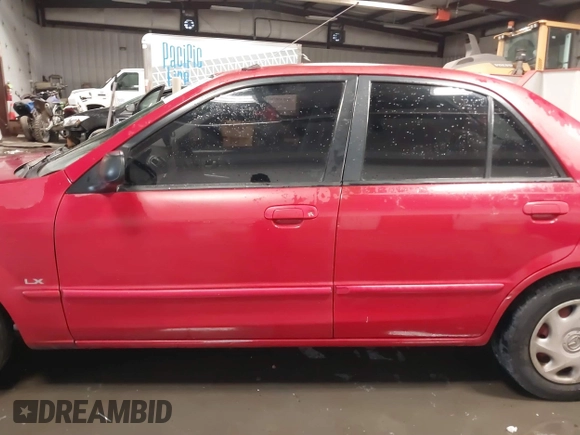 2000 Mazda Protege DX with VIN JM1BJ2220Y0258658, listed as a IAAI auction lot 41622579 with 276,682 mi miles and . Bid and sale history available at DreamBid. Image 15.
