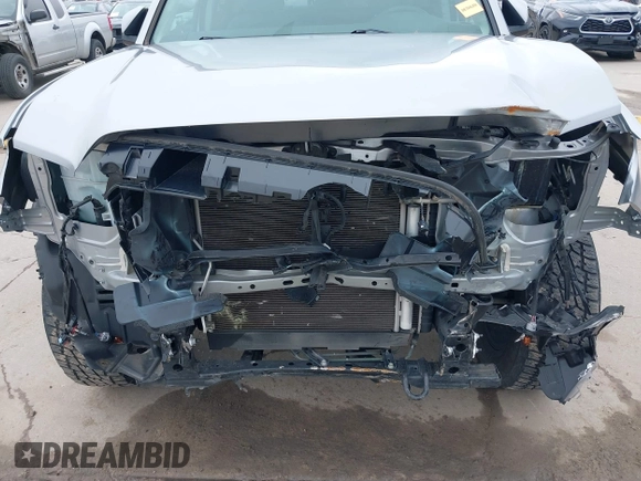 2021 Toyota Tacoma SR with VIN 3TYAX5GN0MT020061, listed as a IAAI auction lot 41592670 with 18,862 mi miles and . Bid and sale history available at DreamBid. Image 6.