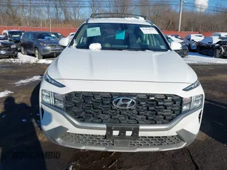 2023 Hyundai Santa Fe SEL z VIN 5NMS2DAJ8PH640338, wystawiony jako IAAI lot #41394066 z przebiegiem 19 064 mil mil oraz . Historia ofert i sprzedaży dostępna na DreamBid. Obrazek 12.