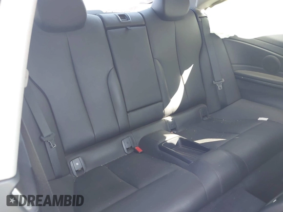 2015 BMW 4 Series 428i xDrive with VIN WBA3N9C59FK248249, listed as a IAAI auction lot 42140141 with 106,916 mi miles and . Bid and sale history available at DreamBid. Image 8.