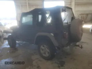 2004 Jeep Wrangler X with VIN 1J4FA39SX4P754012, listed as a Copart auction lot 45239915 with 160,473 mi miles and Salvage title. Bid and sale history available at DreamBid. Image 2.