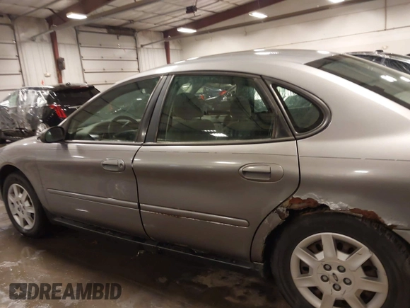 2006 Ford Taurus SE with VIN 1FAFP53U86A113947, listed as a IAAI auction lot 41753927 with 203,867 mi miles. Bid and sale history available at carsss.com. Image 14.