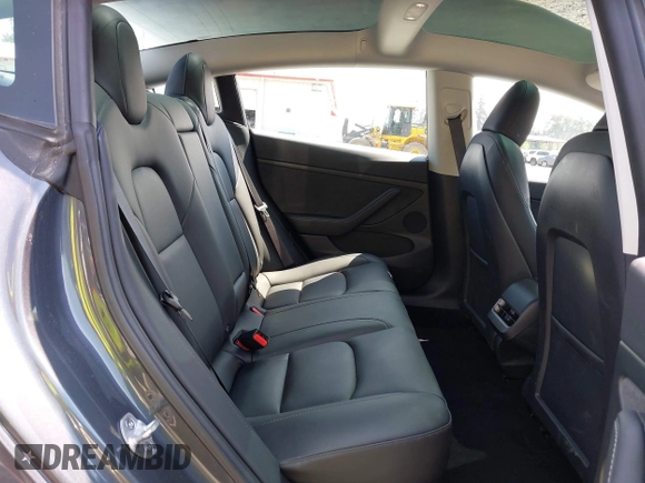 2023 Tesla Model 3 with VIN 5YJ3E1EA6PF664045, listed as a IAAI auction lot 42561039 with 18,708 mi miles and . Bid and sale history available at DreamBid. Image 8.
