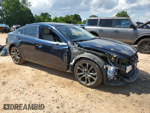 2016 Mazda 6 i Grand Touring с VIN JM1GJ1W55G1461719, выставлен на аукционе Copart как лот 58054385 с пробегом 102 641 миль миль и Списание • Salvage title. История ставок и продаж доступна на DreamBid. Изображение 4.