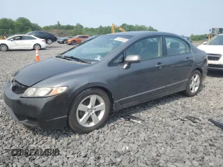 2009 Honda Civic LX z VIN 2HGFA16569H368936, wystawiony jako Copart lot #60455805 z przebiegiem 197 087 mil mil oraz Czysty tytuł • Clean title. Historia ofert i sprzedaży dostępna na DreamBid. Obrazek 1.