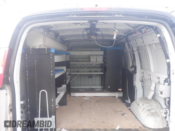 2015 Chevrolet Express Cargo with VIN 1GCWGFCF1F1159413, listed as a IAAI auction lot 42631369 with 155,801 mi miles and . Bid and sale history available at DreamBid. Image 24.