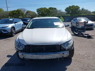 2016 Ford Taurus Limited with VIN 1FAHP2F88GG109434, listed as a IAAI auction lot 41894027 with 220,313 mi miles and . Bid and sale history available at DreamBid. Image 13.