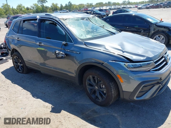 2024 Volkswagen Tiguan SE with VIN 3VVNB7AX6RM161369, listed as a IAAI auction lot 41888229 with 5,173 mi miles and . Bid and sale history available at DreamBid. Image 1.