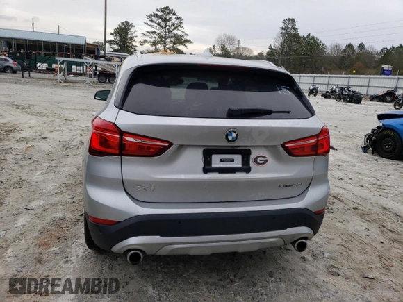 2020 BMW X1 xDrive28i with VIN WBXJG9C05L5P76067, listed as a Copart auction lot 40635893 with 57,184 mi miles. Bid and sale history available at carsss.com. Image 6.