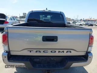 2021 Toyota Tacoma SR with VIN 3TMCZ5AN6MM393306, listed as a IAAI auction lot 42094095 with 57,217 mi miles and . Bid and sale history available at DreamBid. Image 16.