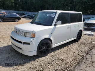 2006 Scion xB z VIN JTLKT324064096333, wystawiony jako Copart lot #62640115 z przebiegiem 193 477 mil mil oraz Czysty tytuł • Clean title. Historia ofert i sprzedaży dostępna na DreamBid. Obrazek 1.