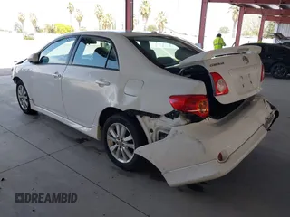 2009 Toyota Corolla with VIN 1NXBU40EX9Z105775, listed as a IAAI auction lot 42054152 with 147,272 mi miles. Bid and sale history available at carsss.com. Image 3.
