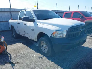 2015 Ram 1500 Tradesman with VIN 1C6RR7FG7FS767634, listed as a IAAI auction lot 41259445 with 133,072 mi miles and . Bid and sale history available at DreamBid. Image 1.