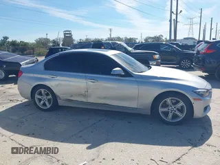 2013 BMW 3 Series 328i with VIN WBA3C1G55DNR49478, listed as a IAAI auction lot 41646742 with 142,034 mi miles and . Bid and sale history available at DreamBid. Image 13.