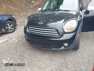 2012 MINI Countryman with VIN WMWZB3C5XCWM30191, listed as a IAAI auction lot 42435291 with 103,254 mi miles and . Bid and sale history available at DreamBid. Image 12.