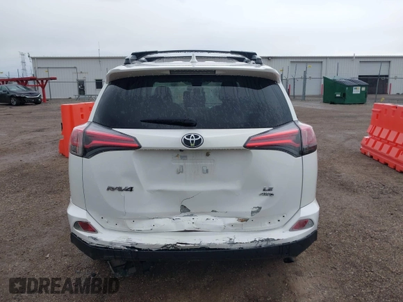 2018 Toyota RAV4 LE with VIN JTMBFREV8JJ722277, listed as a IAAI auction lot 42075684 with 203,458 mi miles and . Bid and sale history available at DreamBid. Image 16.