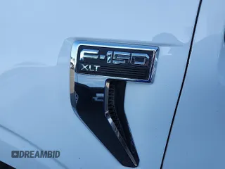 2021 Ford F-150 XL with VIN 1FTFX1E51MKF07502, listed as a IAAI auction lot 42737762 with 90,272 mi miles and . Bid and sale history available at DreamBid. Image 15.