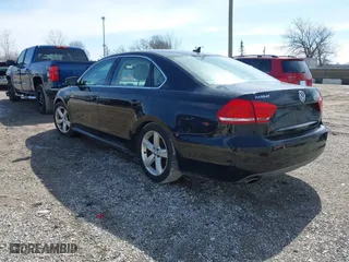 2013 Volkswagen Passat SE with VIN 1VWBP7A35DC102546, listed as a IAAI auction lot 41822612 with 127,334 mi miles. Bid and sale history available at carsss.com. Image 3.