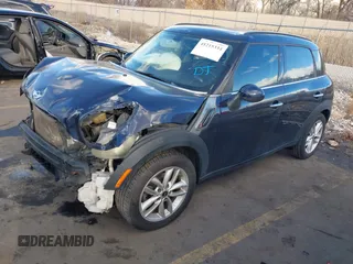 2013 MINI Countryman S with VIN WMWZC3C52DWP21475, listed as a IAAI auction lot 41215334 with 124,365 mi miles and . Bid and sale history available at DreamBid. Image 18.