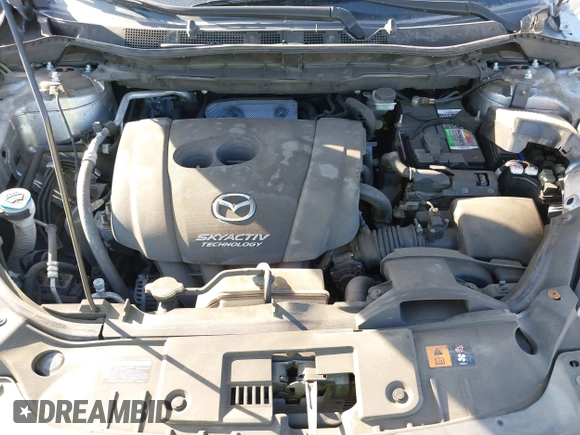 2014 Mazda CX-5 Sport with VIN JM3KE2BE9E0330345, listed as a IAAI auction lot 41377335 with 103,340 mi miles and . Bid and sale history available at carsss.com. Image 10.