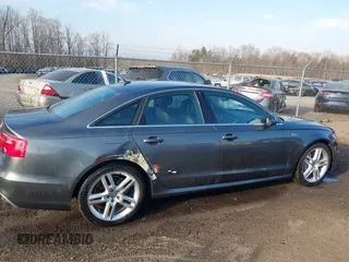 2014 Audi A6 Prestige with VIN WAUHGBFC8EN104920, listed as a IAAI auction lot 41827864 with 70,289 mi miles and . Bid and sale history available at DreamBid. Image 13.