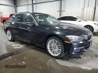 2015 BMW 3 Series 328i xDrive with VIN WBA3B3C50FJ984086, listed as a Copart auction lot 52006475 with 147,065 mi miles and Salvage Title. Bid and sale history available at carsss.com. Image 4.
