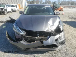 2019 Nissan Sentra S z VIN 3N1AB7AP3KY213698, wystawiony jako Copart lot #77969284 z przebiegiem 80 439 mil mil oraz Szkoda całkowita • Salvage title. Historia ofert i sprzedaży dostępna na DreamBid. Obrazek 5.