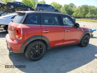 2014 MINI Countryman S with VIN WMWZC3C54EWP25321, listed as a Copart auction lot 54898515 with 48,530 mi miles and Salvage Title. Bid and sale history available at DreamBid. Image 3.