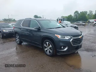 2018 Chevrolet Traverse LT z VIN 1GNEVHKW3JJ195926, wystawiony jako IAAI lot #42305224 z przebiegiem 95 571 mil mil oraz . Historia ofert i sprzedaży dostępna na DreamBid. Obrazek 1.