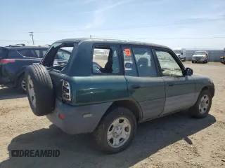 1999 Toyota RAV4 with VIN JT3GP10V9X7044726, listed as a Copart auction lot 55180935 with 196,509 mi miles and Salvage Title. Bid and sale history available at DreamBid. Image 3.