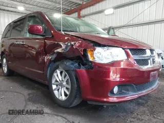 2018 Dodge Grand Caravan SXT with VIN 2C4RDGCG4JR297603, listed as a IAAI auction lot 42144645 with 114,098 mi miles and . Bid and sale history available at DreamBid. Image 6.