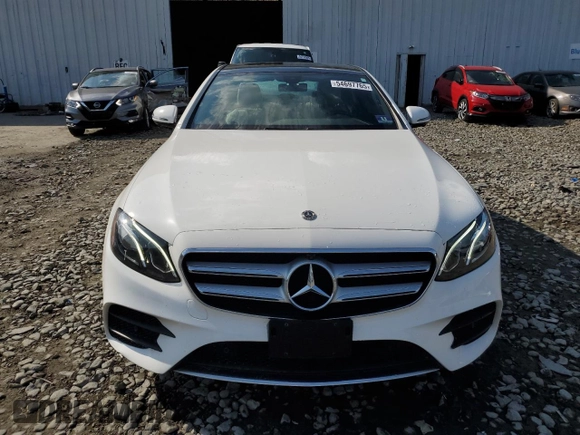 2019 Mercedes-Benz E 300 with VIN WDDZF4KB9KA520910, listed as a Copart auction lot 54697765 with 69,324 mi miles and Salvage title. Bid and sale history available at DreamBid. Image 5.