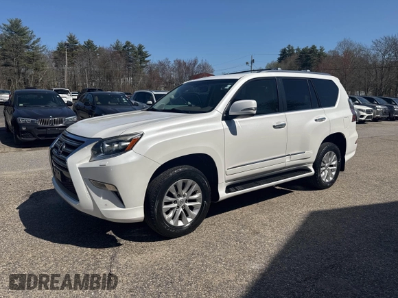2014 Lexus GX with VIN JTJBM7FX1E5090308, listed as a IAAI auction lot 42130546 with 132,247 mi miles. Bid and sale history available at carsss.com. Image 2.