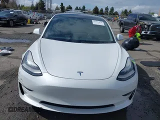 2020 Tesla Model 3 Long Range with VIN 5YJ3E1EB6LF619528, listed as a IAAI auction lot 41937430 with 70,327 mi miles. Bid and sale history available at carsss.com. Image 13.