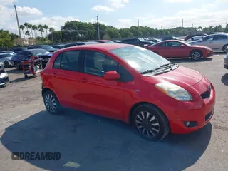 2010 Toyota Yaris with VIN JTDKT4K31A5318034, listed as a IAAI auction lot 41322096 with 114,817 mi miles. Bid and sale history available at carsss.com. Image 1.