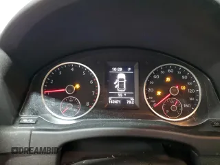 2013 Volkswagen Tiguan SE z VIN WVGBV3AX1DW579506, wystawiony jako Copart lot #52719575 z przebiegiem 163 471 mil mil oraz Szkoda całkowita • Salvage title. Historia ofert i sprzedaży dostępna na DreamBid. Obrazek 9.