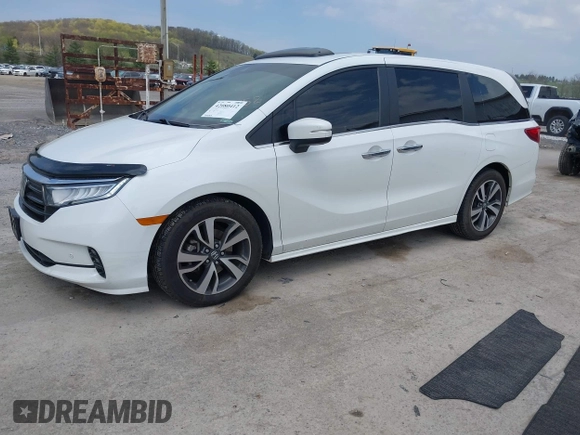 2021 Honda Odyssey Touring with VIN 5FNRL6H80MB010952, listed as a IAAI auction lot 42080412 with 90,594 mi miles and . Bid and sale history available at DreamBid. Image 17.