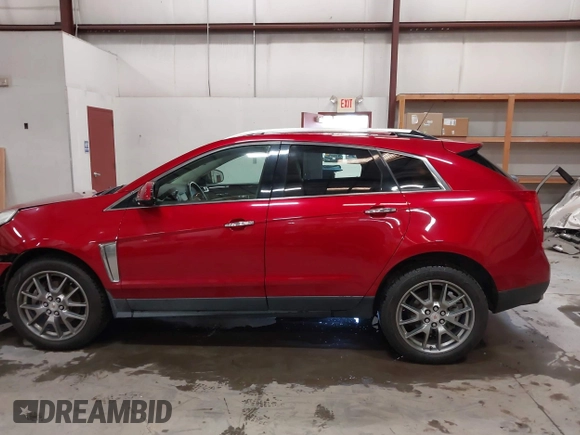2016 Cadillac SRX Performance Collection z VIN 3GYFNCE32GS571230, wystawiony jako IAAI lot #42417263 z przebiegiem 59 634 mil mil oraz . Historia ofert i sprzedaży dostępna na DreamBid. Obrazek 14.